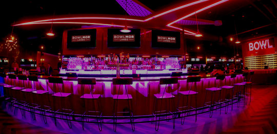 bar area with neon lighting