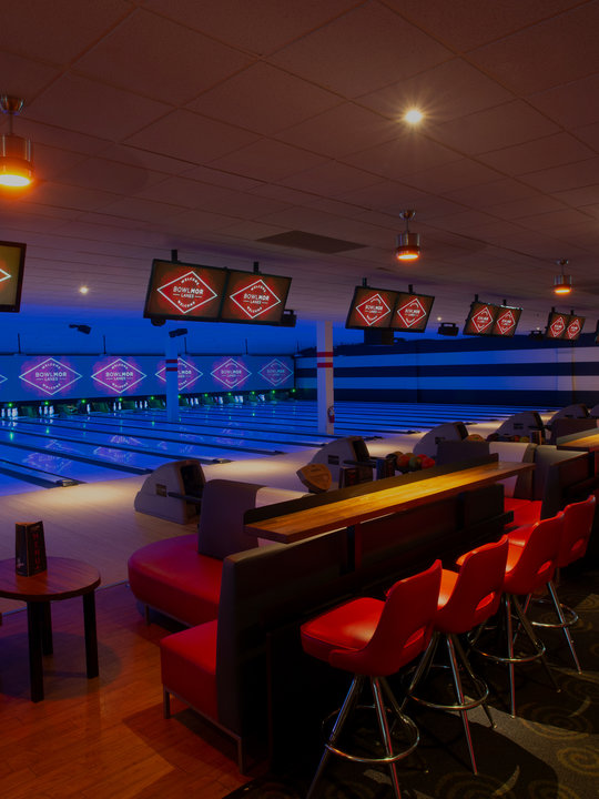 lanes with bar stools in back