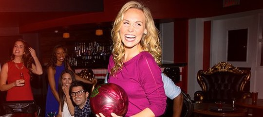 woman holding a red ball